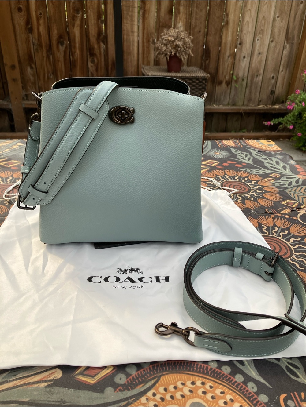 Like New: Coach willow bucket bag in sage blue/pewter metal.